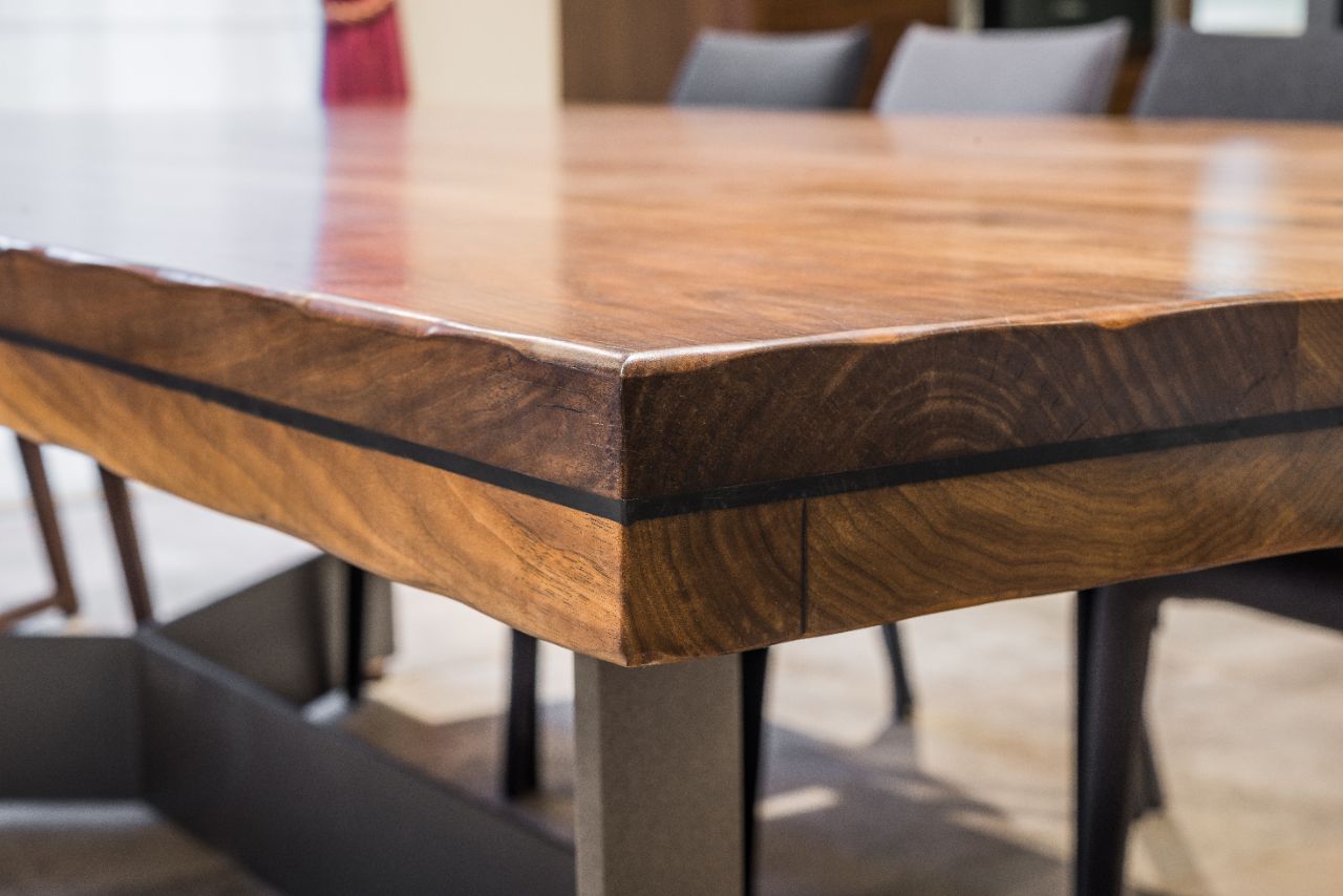 Close-up of a luxurious table corner , vintage solid wood furniture detail