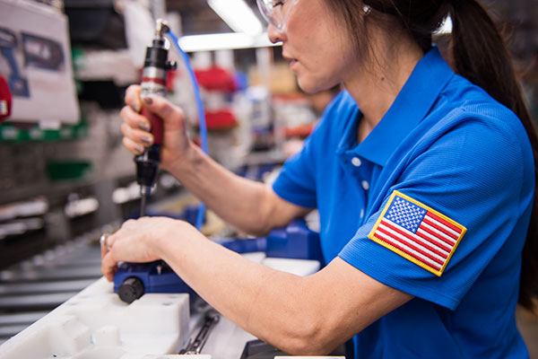 woman on assembly with american flag