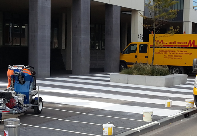 spraying reflective paint on the ground