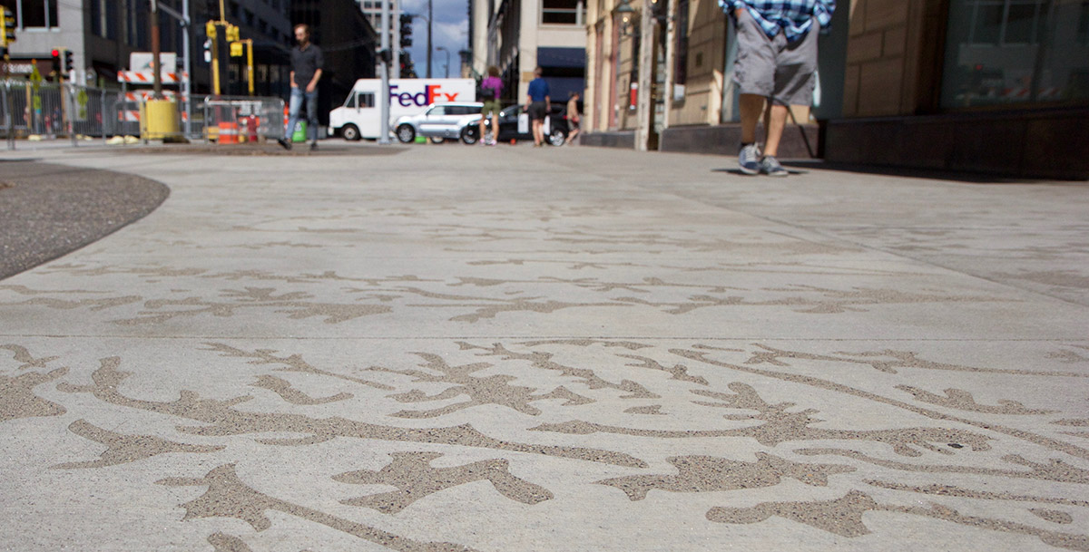 Finished sidewalk with stencil pattern