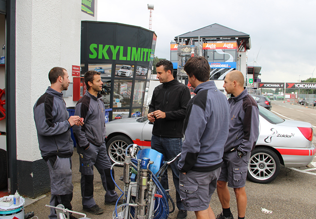 Trainingssessie verf spuiten en belijning van Graco