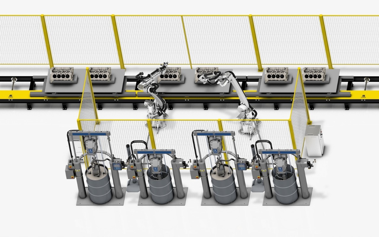 Equipos Graco usados en la sección de trenes de potencia de una cadena de montaje automática en una fábrica automatizada.